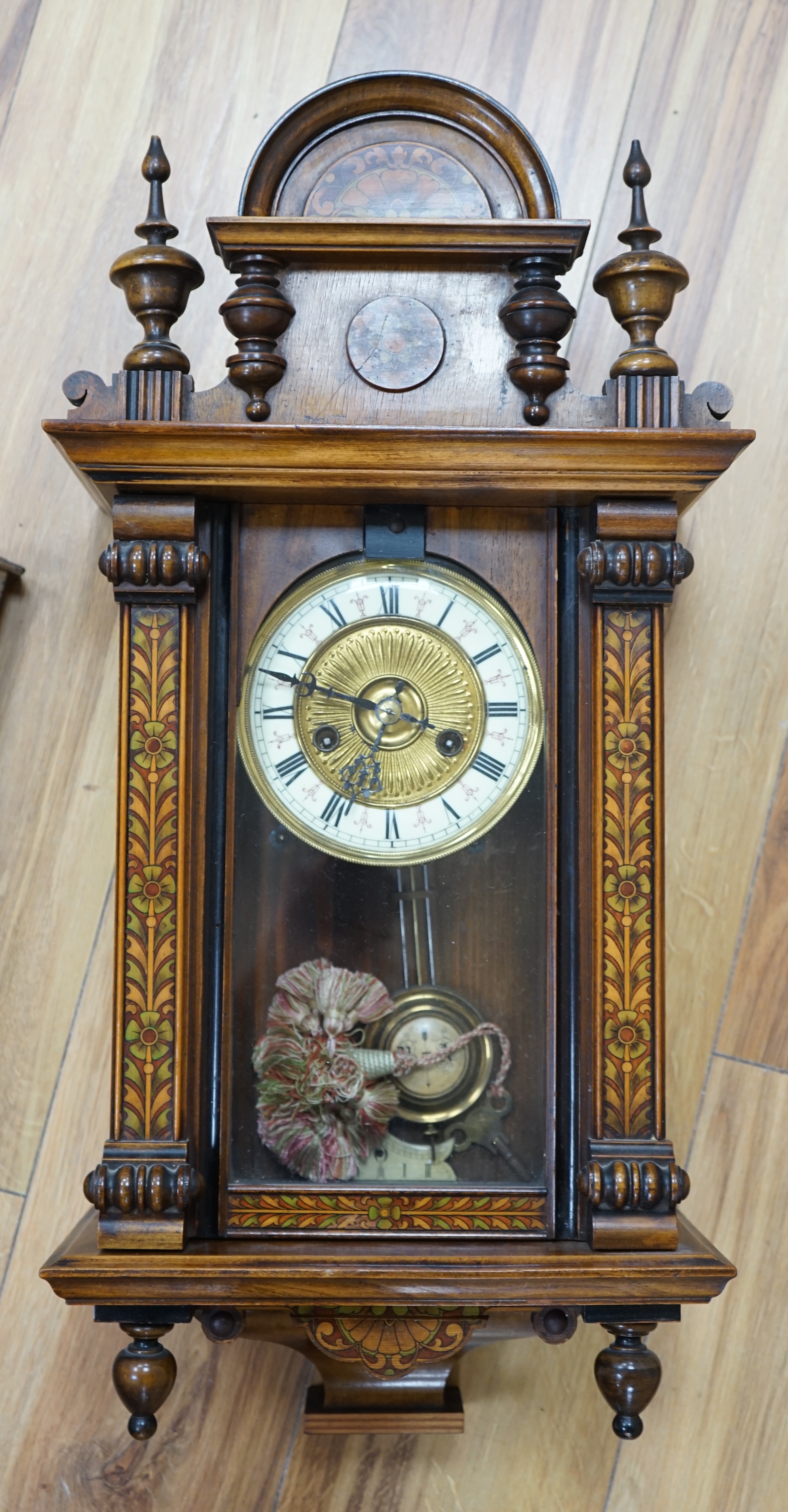 A Vienna style pen worked mahogany wall clock, 61cm. Condition - fair, bottom finial missing, not tested as working